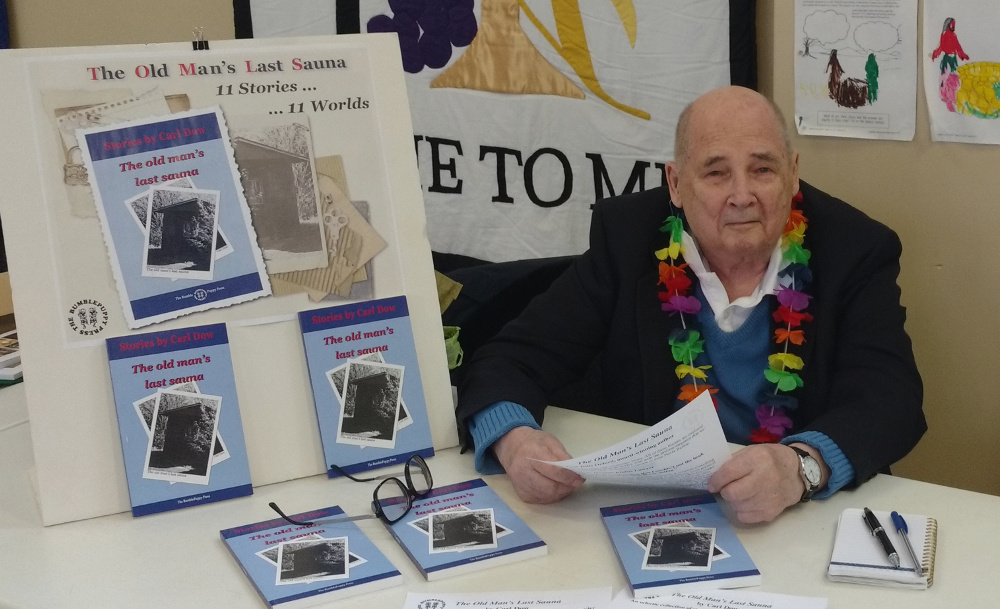 Carl Dow with copies of The Old Man's Last Sauna, December 19, 2017 Carl-book-fair_2017-12-09